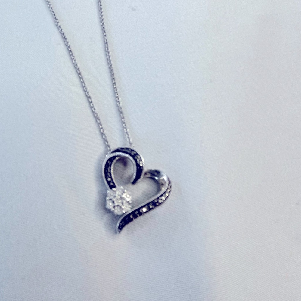 Beautiful black heart pendant with a 18in sterling silver chain